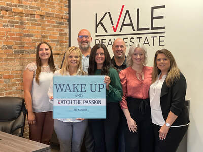 Team photo from Kvale Real Estate Wake Up Alexandria event